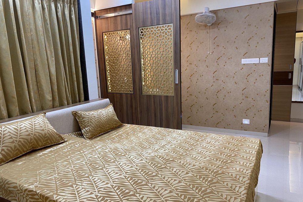 Bedroom with Gold Texture in Pune